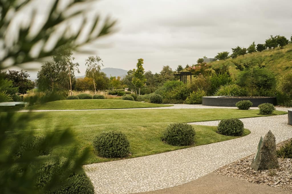 A thoughtfully designed garden layout with soft landscaping and structured borders.